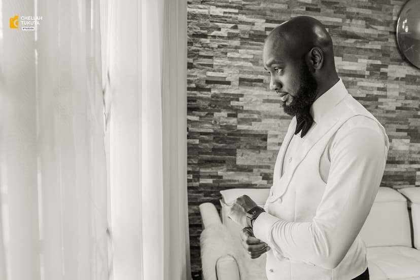 Groom getting ready black and white