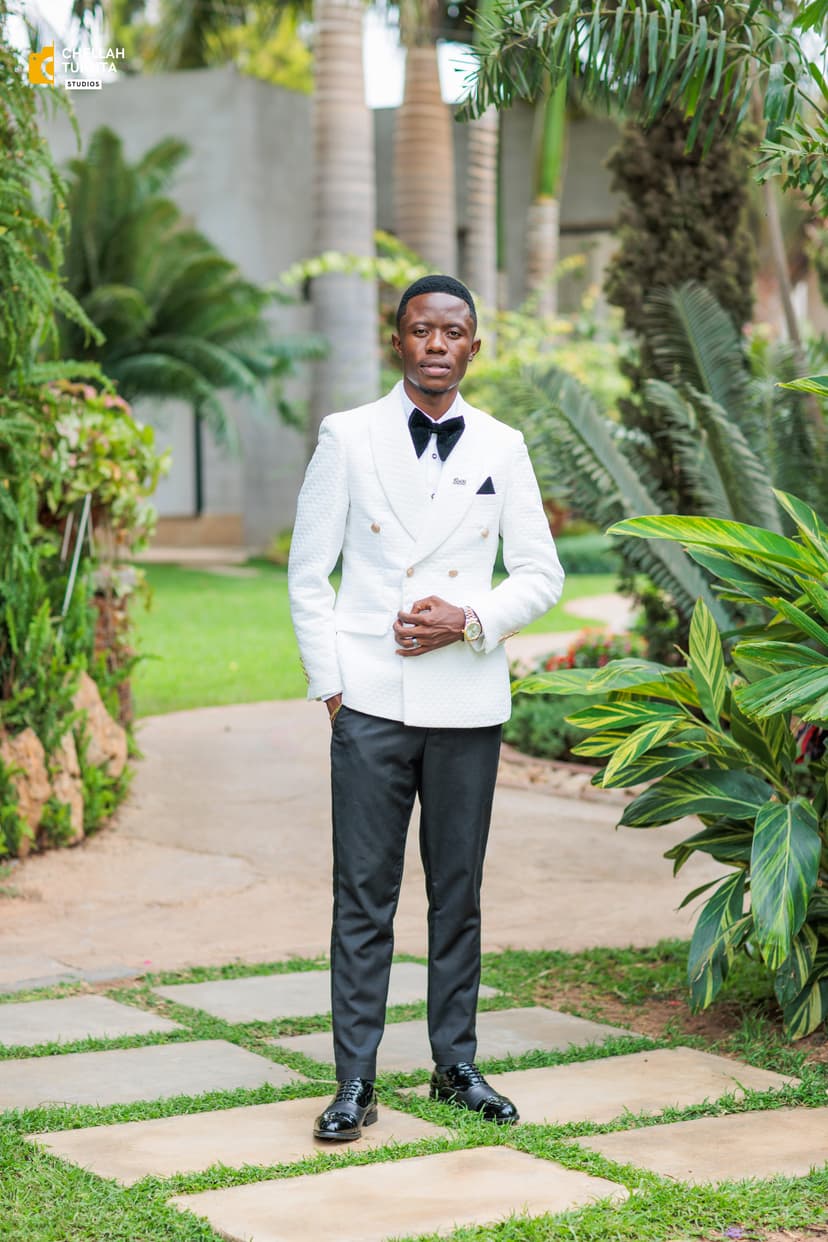 Groom portrait in garden